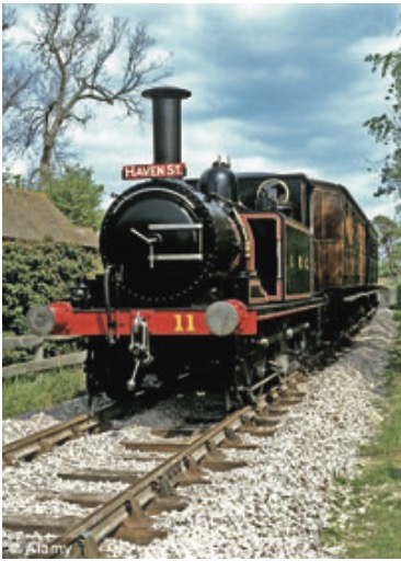 Vintage steam locomotive No. 11 running on the railway tracks
