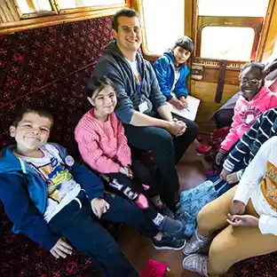 Children enjoying a steam train ride on an Education Destination Hampshire school trip